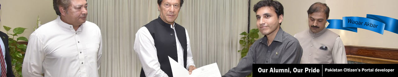 Prime Minister Imran Khan awarding certificate to Waqar Akbar PMRU Programmer